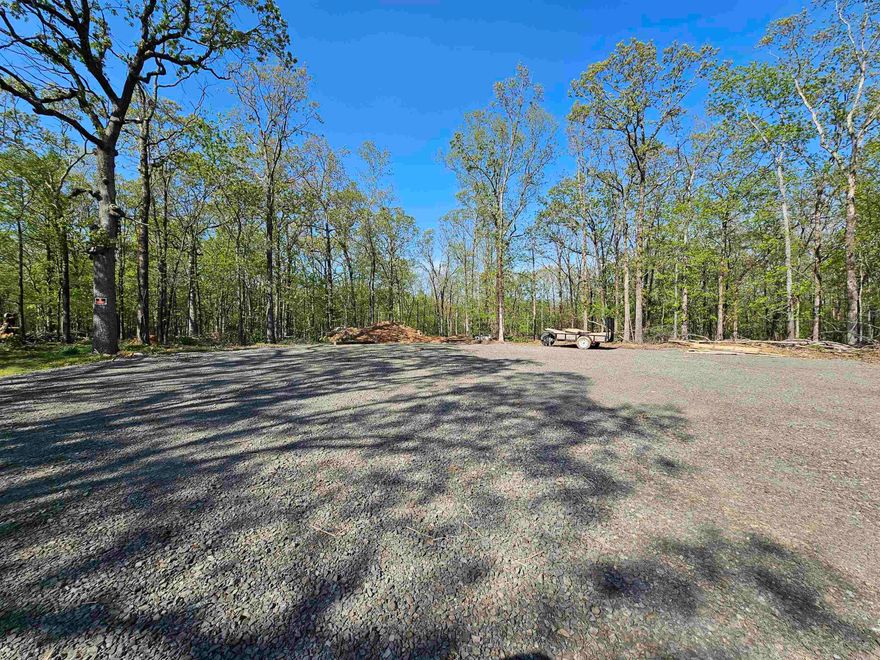 This land is ready for construction.  The road, utilities and fire hydrant have already been put in place.  The owner has already cleared an area for a home site and a shop. The location is perfect...situated next to Bushwood Estates subdivision and is convenient to everything.