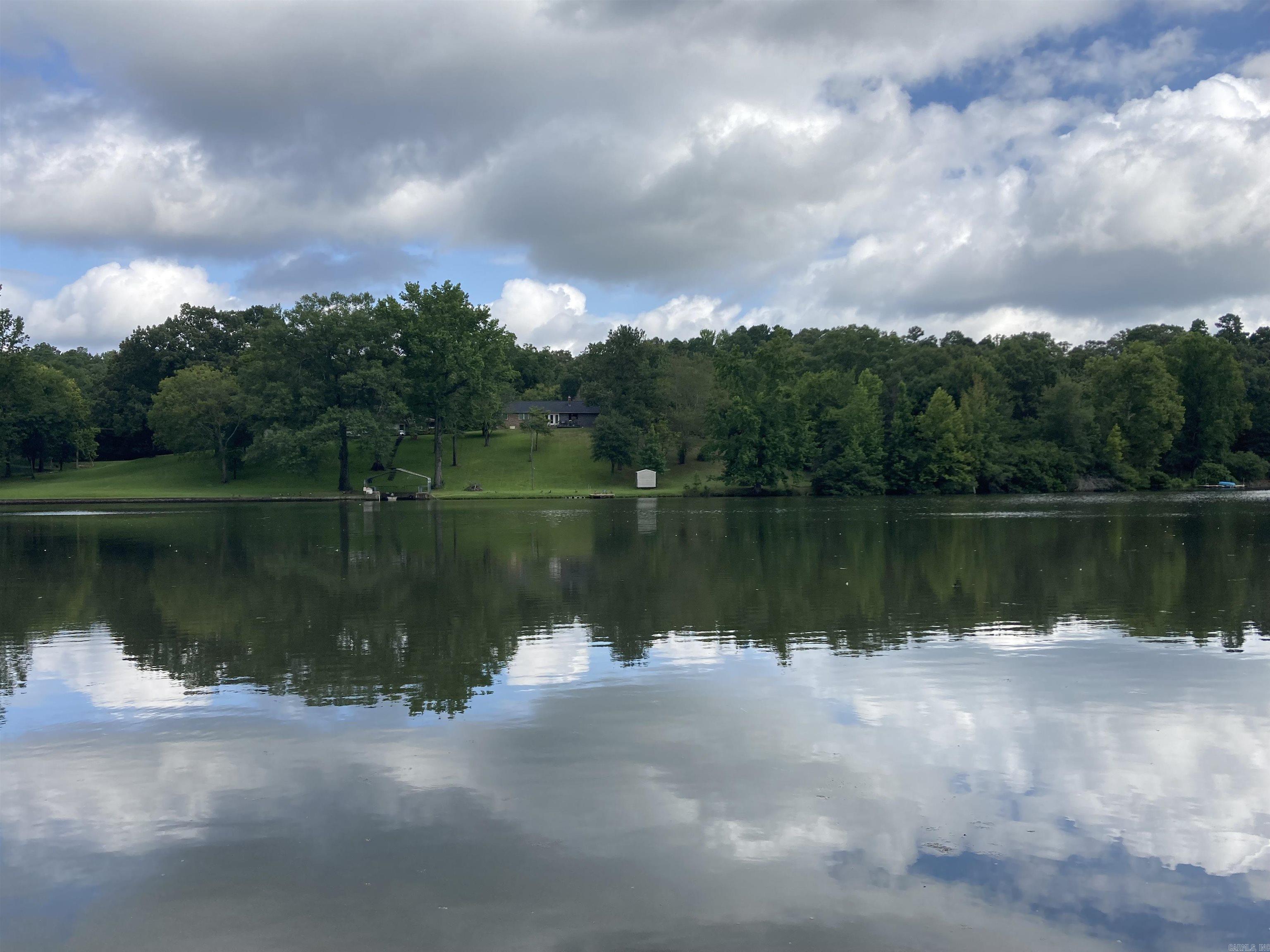 Rare opportunity to build your dream home or weekend getaway on this quiet, wooded lot with Lake?Catherine access. Thick hardwood canopy provides serene privacy and shade. Located in a peaceful, well-established lakeside neighborhood just minutes from recreational amenities and downtown Hot?Springs.