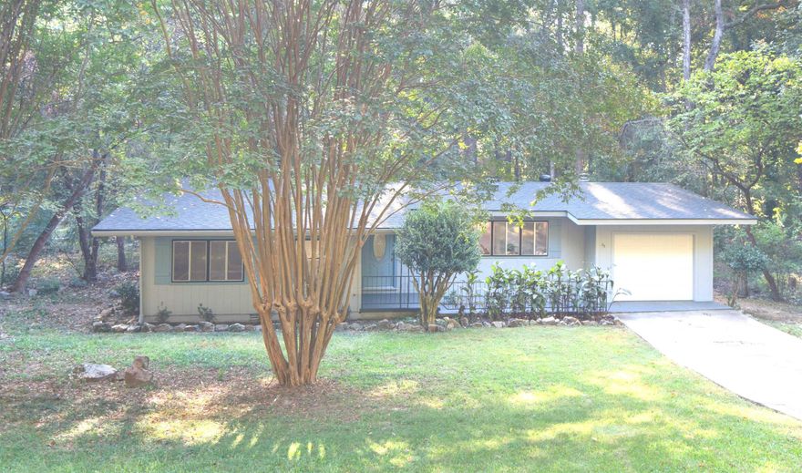 HOT SPRINGS VILLAGE: MOVE-IN READY MID-CENTURY MODERN GEM!  Ready to close and relax? This completely turnkey home is the one. Located Hot Springs Village, America's largest gated community, this updated Mid-Century Modern is positioned for immediate enjoyment.  Forget repair budgets and waiting lists—this home is done! Featuring a brand new roof and HVAC system, plus a fresh, modern aesthetic with updated kitchen, baths, and flooring throughout.  Your Arkansas lifestyle awaits just moments from your door: Lake Desoto for boating, hop on a cart for a round at the Desoto Golf Course, or explore miles of renowned hiking trails. Stop scrolling and start packing. This rare gem is priced and positioned for a fast, smooth closing—don't miss your chance!