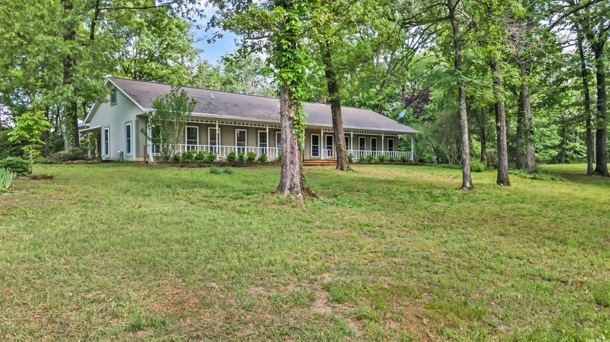 Lovely open concept home on almost 20 acres with Robinson Creek running through it. Lovely meadows and hayfields, but just enough woods for privacy. Gorgeous flowering shrubs, such as peonies and azaleas. Mountain views from several directions. Front porch is to die for, as it extends across the whole front of the house. More land is available if you need it. Call today!