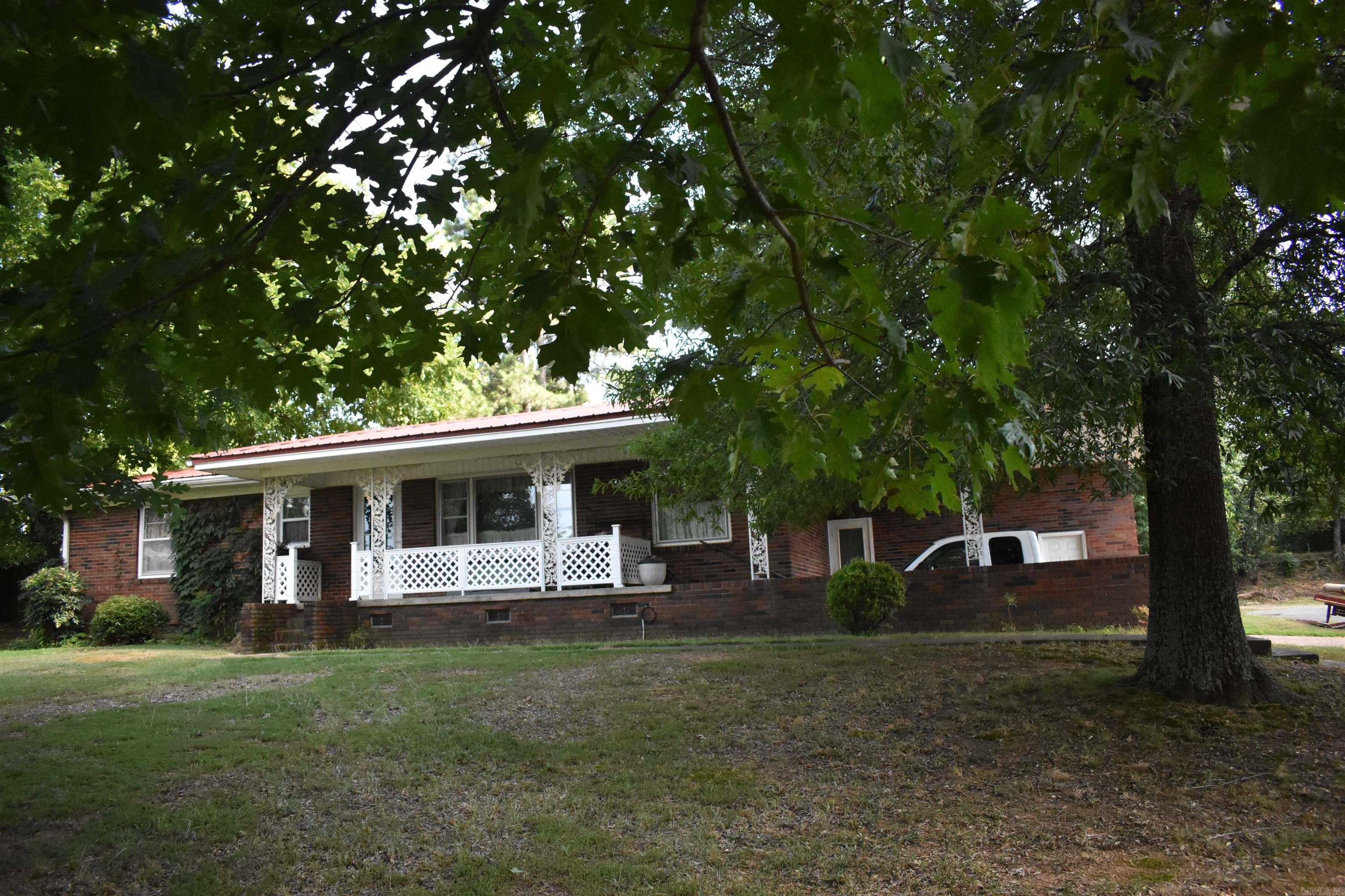 Look at this wonderful yard that makes you feel like you are in the country. Large lot with fig trees and grape vines. The house has addition on it that could be a great play rm. or a 3 bedroom if needed. The house has large rms. that make it feel spacious. The house has lots of storage through out.
