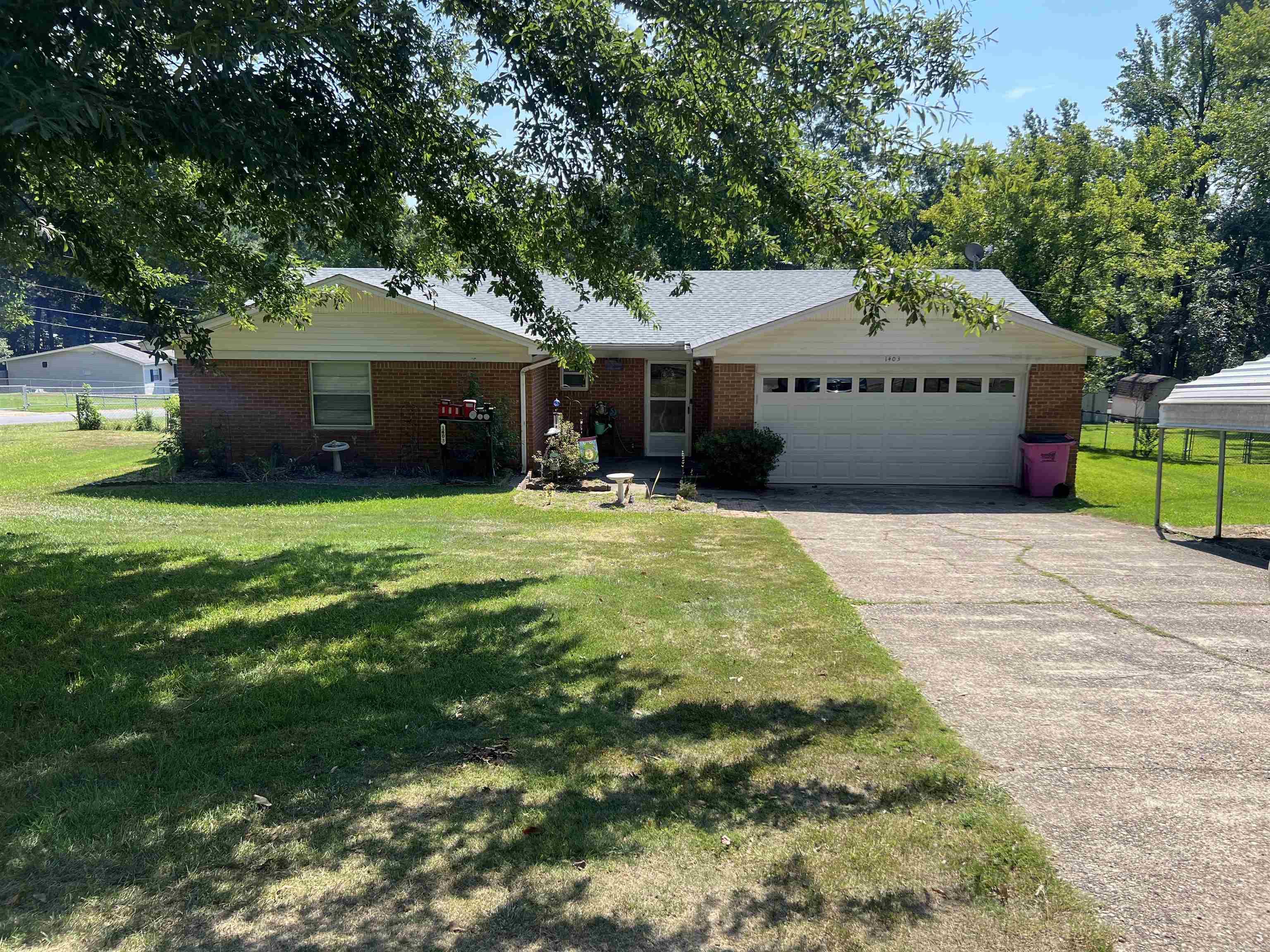 Huge corner lot, large one level all brick home and shop in the back! Loads of potential with this home, and lovely back deck! Roof is 2021, hvac 2022 and hwh 2018. Property is being sold "as is", no disclosures and is in an estate.