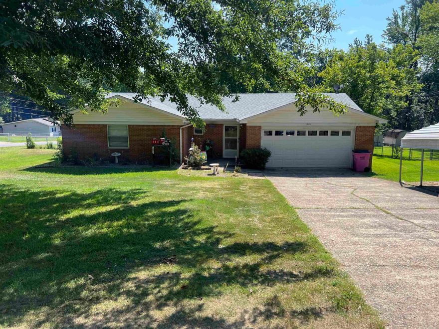 Huge corner lot, large one level all brick home and shop in the back! Loads of potential with this home, and lovely back deck! Roof is 2021, hvac 2022 and hwh 2018. Property is being sold "as is", no disclosures and is in an estate.