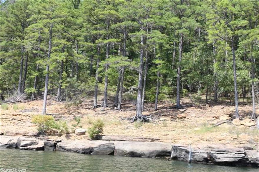 Great Lakefront Lot with excellent red and white lines.  Located on the S end of Silver Ridge Peninsula.    Front Row seat at annual 4th of July fireworks show.  1/2 minerals will convey if owned by seller.
