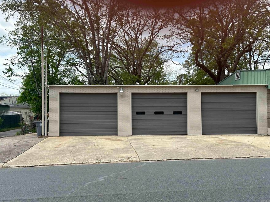 Need a garage? This one is ready to go from day one! Offering approximately 1,440 sq ft of heated and cooled space, this fully updated garage features a new roof, fresh interior and exterior paint, bright LED lighting, and three bay doors plus a side entry door for convenience. Inside, you’ll find a bathroom and an air compressor already in place—perfect for a variety of uses. Whether you’re looking to start a business, expand operations, or create the ultimate workshop, this property has endless potential.  Buyers should verify city zoning to confirm business use and confirm building and lot square footage as part of due diligence.  ---Agent See Remarks---