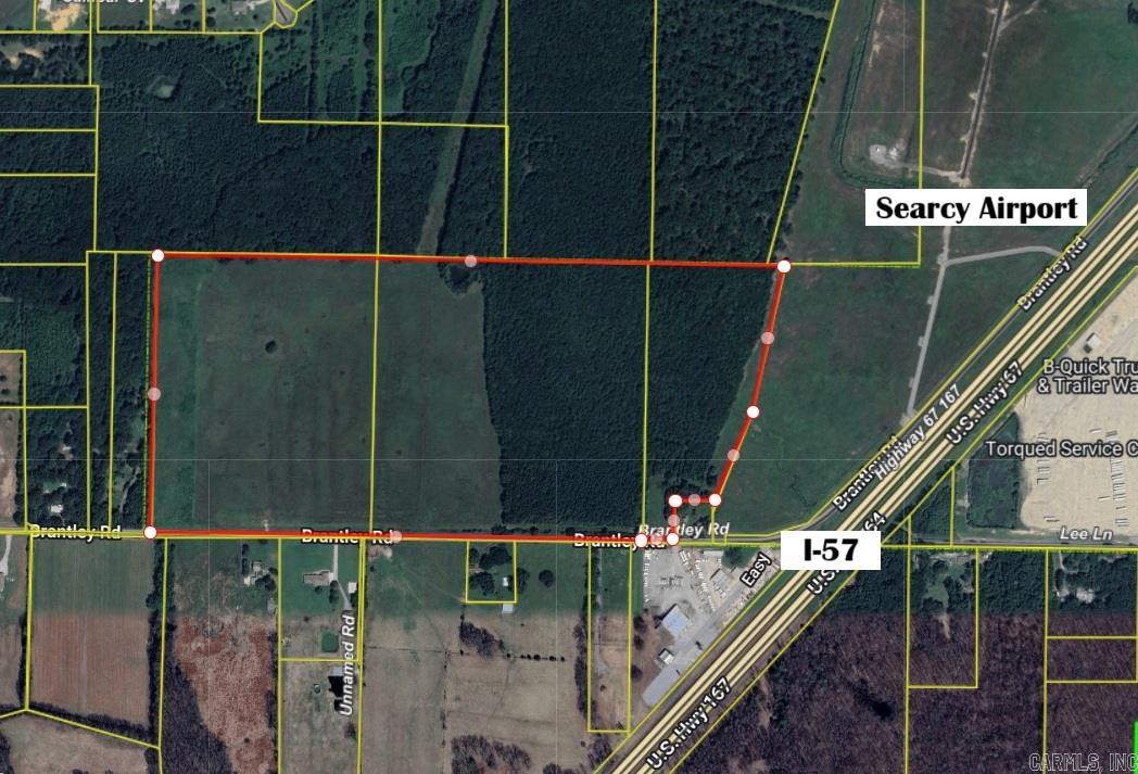 This property is conveniently located just off I-57 and is primed for significant development. Currently zoned I-1 for industrial use, its strategic proximity to Searcy Regional Airport, Walmart Distribution Center, and the City of Searcy's South Main Project, which includes a new community center, offers limitless opportunities for potential growth and investment.