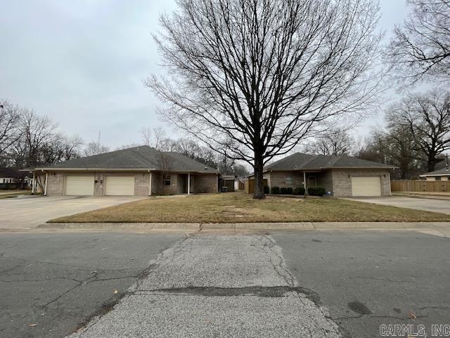 Great investment with all 5 units with long term rent. Each is unique with private patio area with each Neutral colors and garage parking. Water is paid with rent and are all electric. The 6th apartment has more enimenties including a separate workshop storage area with covered outside sitting area and small private yard with garden.