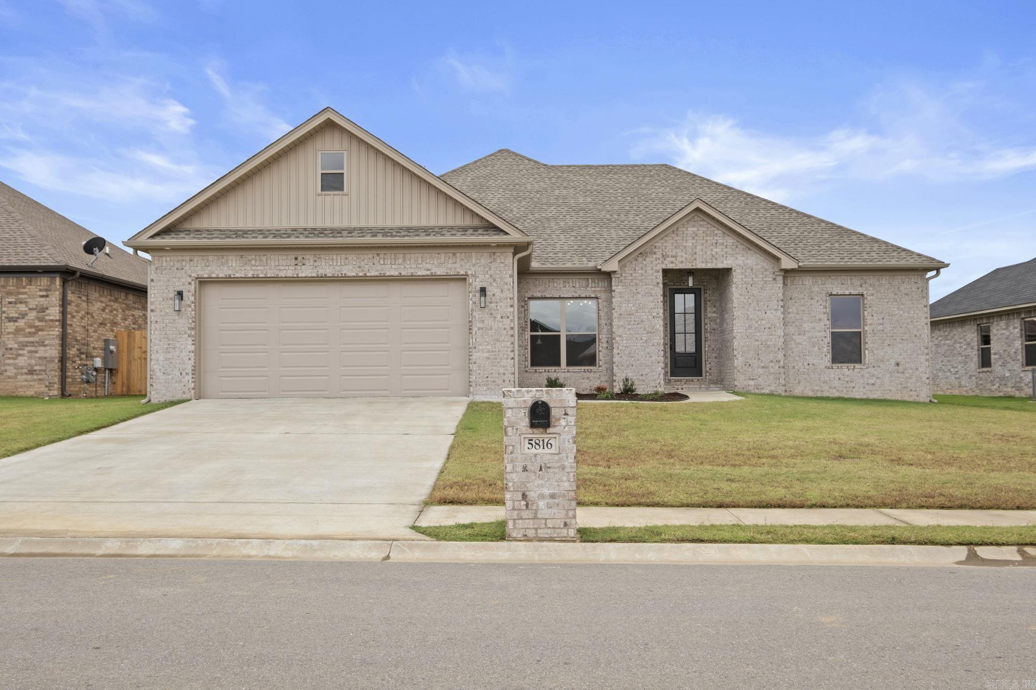 This stunning new construction home features a spacious, open floor plan designed for modern living. The heart of the home is the large kitchen, complete with an oversized island perfect for entertaining, stainless steel appliances, pantry, a sleek gas range, and ample counter space. The island features extra storage space as well! Flow seamlessly into the living area, where a cozy gas fireplace provides the perfect ambiance. The thoughtfully designed layout offers privacy with the primary bedroom set apart from the other bedrooms, creating a quiet retreat. You will love having the luxury vinyl plank throughout that is easy maintenance! Enjoy the outdoors while relaxing on your covered back porch. This home is conveniently located 5 minutes from LRAFB and access to the highway.