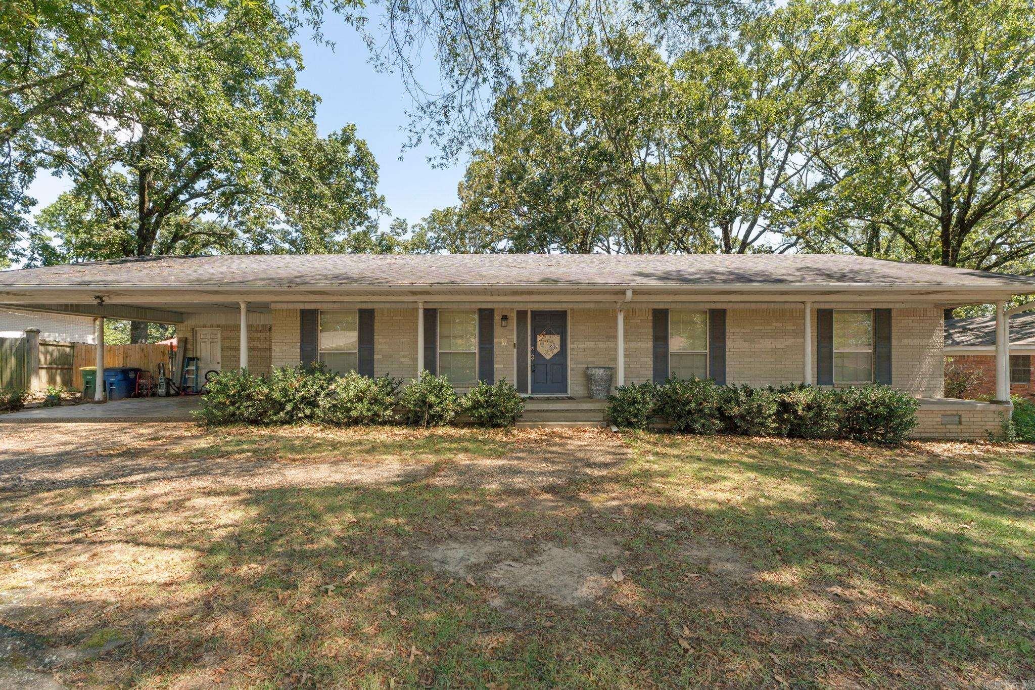 Welcome to this beautifully maintained 3 bedroom, 2 bath home in the desirable Lakewood neighborhood. This cozy yet spacious home features a stunning brick fireplace, perfect for relaxing or entertaining guests. The large dining room provides plenty of space for family meals or dinner parties, while oversized windows throughout the home flood with the space with natural light. Thoughtfully designed, this home is ready to create new memories with its inviting atmosphere and classic charm. With plenty of space and warmth, this home offers the perfect balance of comfort and style. Don't miss this opportunity to make this gem yours.