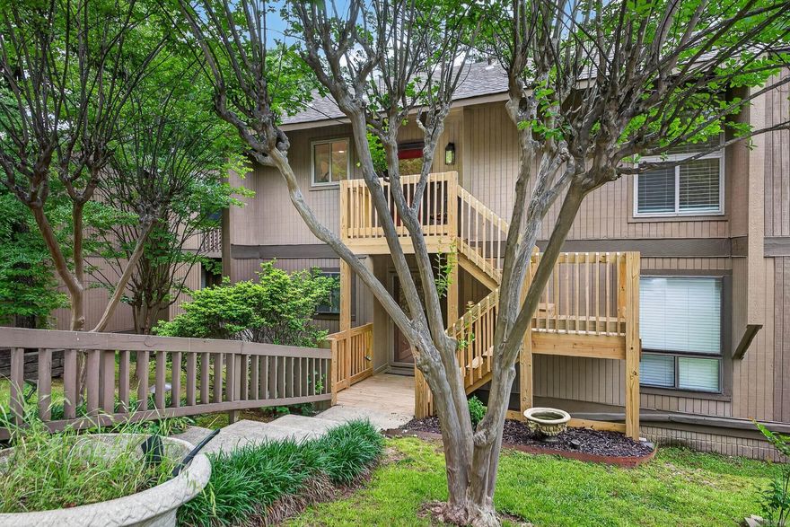 Welcome to low-maintenance living in the heart of The Heights! This beautifully renovated 2 bedroom, 2 bathroom condo offers modern updates and a functional layout with stylish finishes throughout. Features include LVP flooring throughout the main living areas and tile flooring in both bathrooms. The updated kitchen boasts quartz countertops, tile backsplash, stainless steel appliances, an island with bar seating, and the refrigerator plus stackable washer and dryer convey. The living room features an electric fireplace and sliding glass doors leading to two separate balconies, including a rear balcony overlooking a peaceful wooded area. The primary suite offers a versatile vanity space perfect for a home office setup or dressing area, along with a walk-in closet and a beautifully updated tile walk-in shower. Additional features include an exterior storage room located off the side balcony. Conveniently located near shopping, dining, and all that Little Rock has to offer!