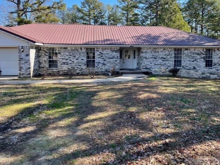 If your looking for Country living, this is what you have been looking for! This home features a large living room with a gas log fireplace, spacious kitchen with large island and custom built cabinets, 4 good sized bedrooms, extra large area that could be a sunroom or second living area and a large fenced in back yard. Oh, did I mention it is located on 7.3 Acres