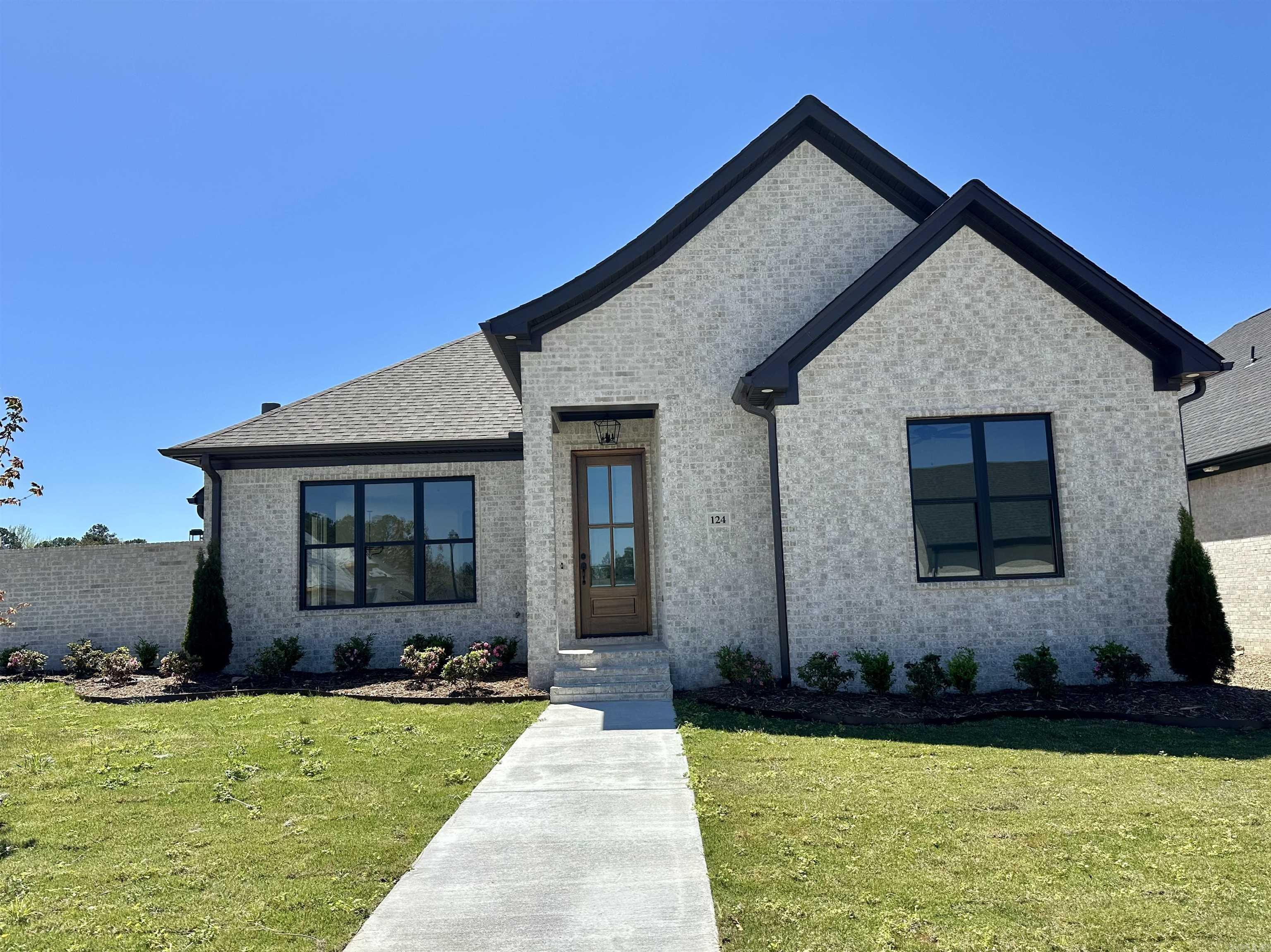 New home that offers an inviting open floor plan, seamlessly blending the eat-in kitchen with an island featuring seating, and complimented by sleek stainless steel appliances. With 3 bedrooms, 2 baths and laundry room comfort is assured. Enjoy a private patio, perfect for outdoor relaxation. Side load garage on a corner lot adds convenience