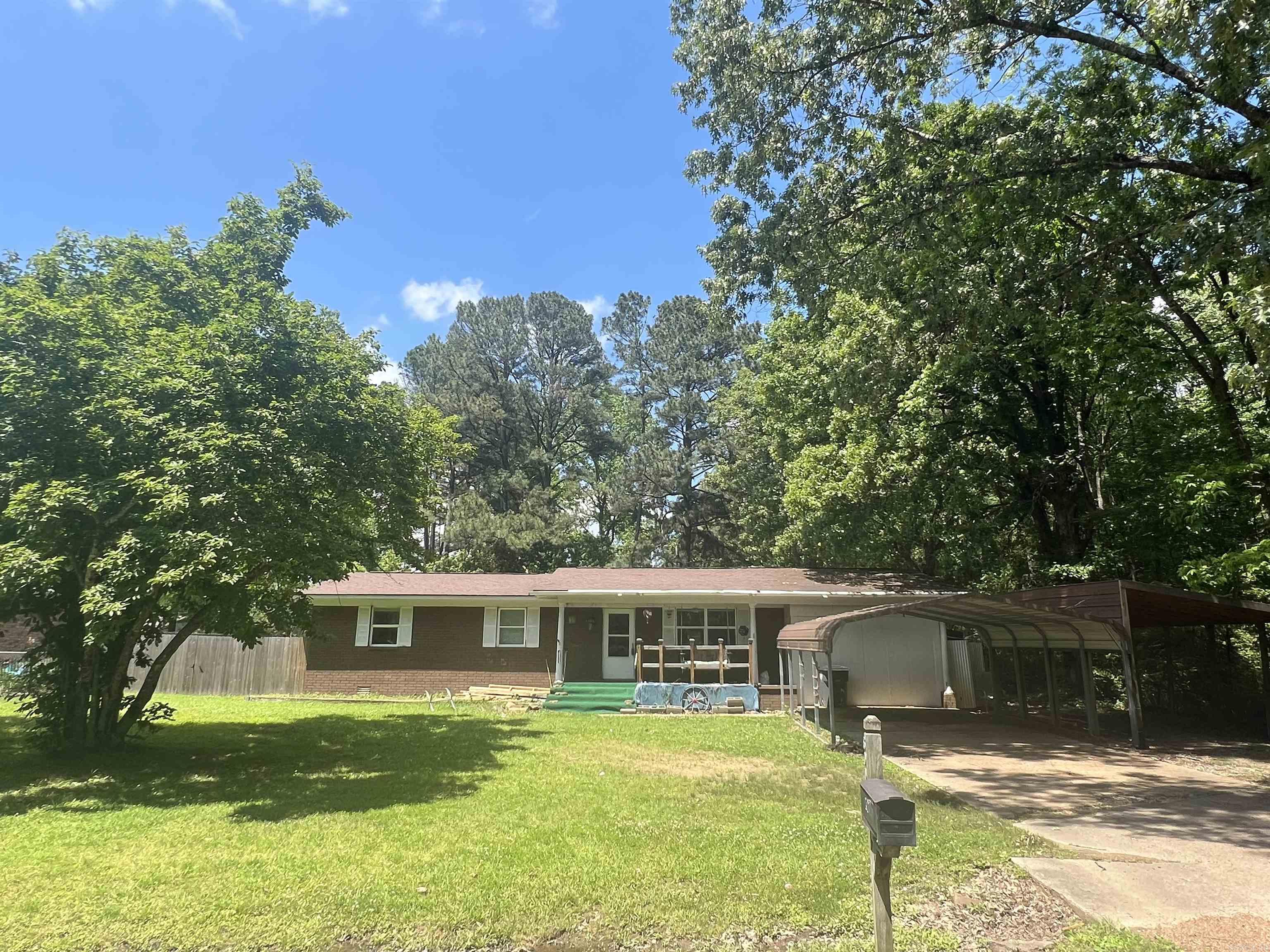 Come enjoy the covered front porch swing at this nice 3 bedroom, 1.5 bath home with an additional bonus room. Doorway widened to give the home an open flow from living area into kitchen and dining. Large utility room with room for storage. Many updates including new roof in 2012 and HVAC approx 8 years old. Big privacy fenced back yard at the end of the street, with a storage building.