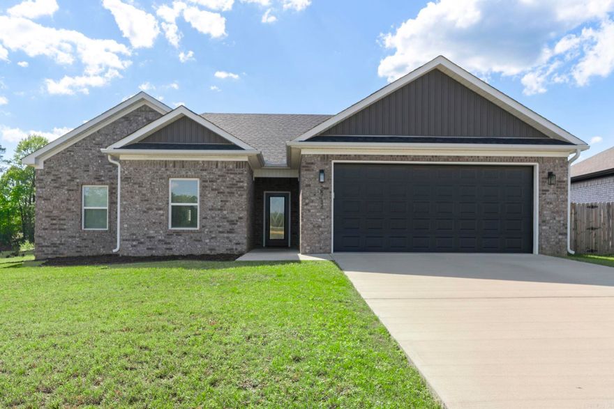 You don't want to miss this gorgeous like-new home in a brand new subdivision in Bryant School District! This beautifully designed 3-bedroom, 2-bathroom home offers 1,700 sq feet of thoughtfully laid-out living space, perfect for families or those who love to entertain. Step inside to discover the open-concept living area that features luxury vinyl flooring, modern finishes throughout, a spacious walk-in pantry, and plenty of counter space in the kitchen for all your culinary creations. The primary suite includes a private ensuite bathroom and ample closet space with his and her closets, while the additional bedrooms offer flexibility for guests, a home office, or a growing family. Outside, enjoy the fully fenced backyard with a covered patio making it the perfect outdoor space. This home is move in ready!! Schedule your showing today!