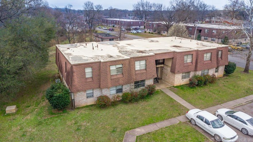 Investor Alert! 24 total cash flowing units in the heart of Russellville! 16 one bedroom and 8 two bedroom units with a low vacancy rate. Some units have been updated with new floor and paint. Also included is a washer and dryer building with all contents to convey to the new buyer. Hard to find units so take a look before they are gone!