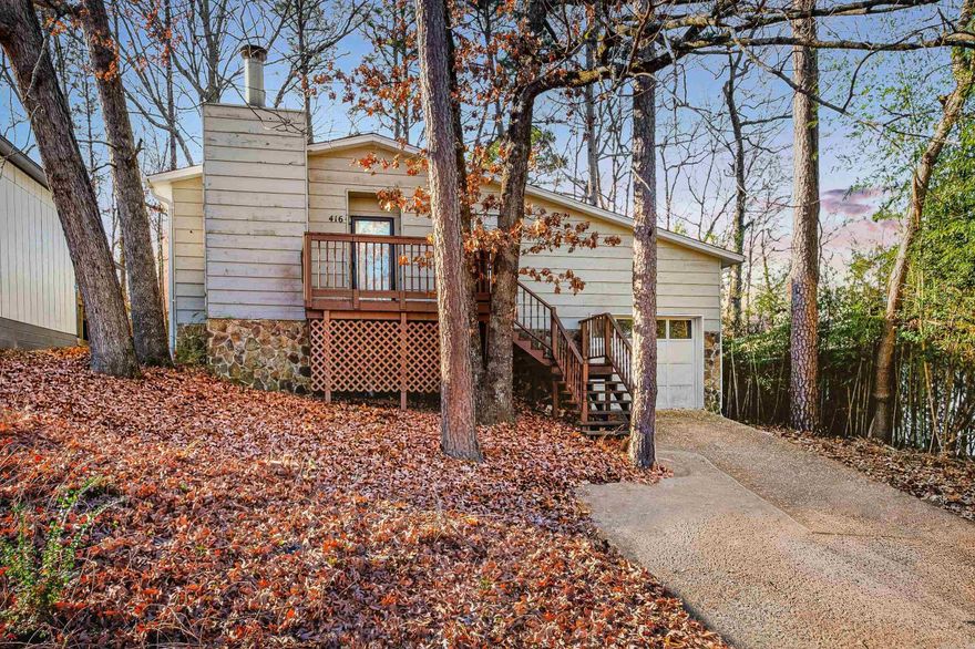 One story, updated WLR home that is conveniently located near tons of dining/retail options! Extensively remodeled in 2025, this property features so many significant improvements such as the new architectural shingle roof, LVP flooring throughout, modern light & plumbing fixtures, freshly painted interior, and more! The kitchen is open to a spacious dining area and has been tastefully updated with new countertops, cabinet hardware and new stainless steel appliances. Both bathrooms include new vanities (double vanity in hall bath) and sleek, tiled walls in the walk-in shower in primary bath & tub in hall bath. Water heater replaced in July 2022. Enjoy the private, natural backyard from the large deck/sitting area. One-car garage with auto door opener, storage room & access to backyard. Extra parking pad in front.