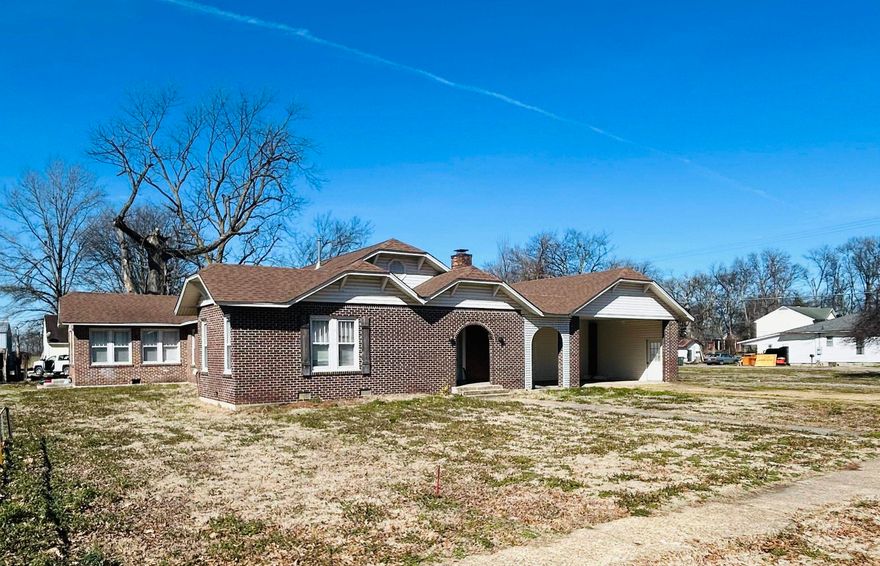 Welcome to the market this charming 1925-built home, nestled in the heart of Tyronza, offering a unique blend of historic character and modern comfort. This house has had a new roof placed on it in 2020 and it has also had new HVAC in 2021. This home provides 4-5 spacious bedrooms, 3 bathrooms, and 2 inviting living areas, this home provides plenty of space for families of all sizes. The main floor boasts 2,838 square feet of living space, featuring beautiful, well-maintained original hardwood floors and soaring ceilings that exude timeless elegance, along with an estimated 200 square-foot basement that adds even more potential for customization, whether for a recreation area, home office, or extra storage. Situated on a lush .52-acre lot. There is also storage/workshop with the attached to 2 car carport This home is within walking distance to local amenities, including the bank band church, offering the perfect balance of privacy