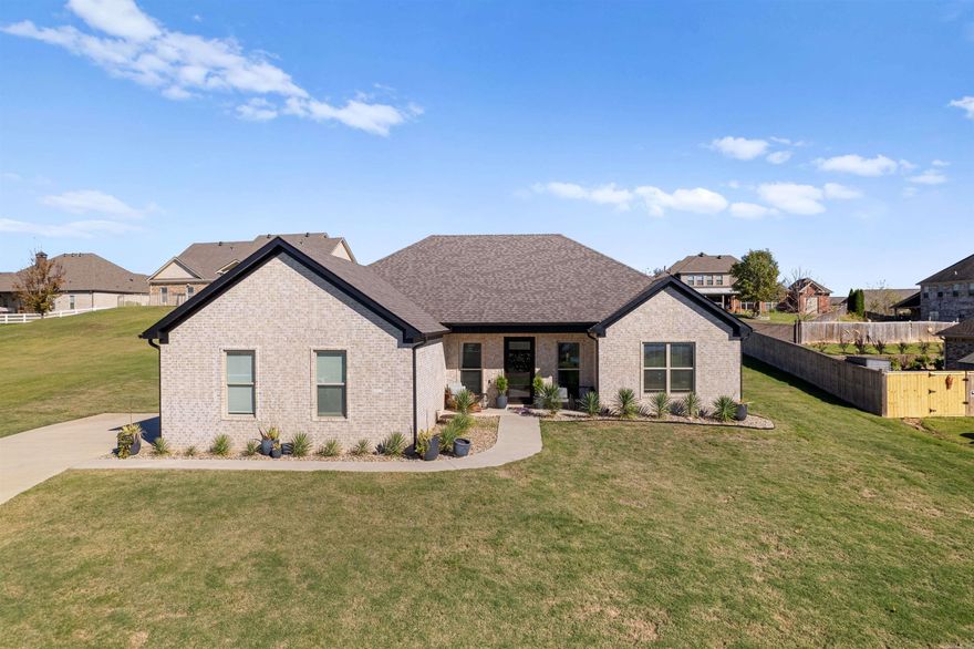 Enjoy stunning views of the Arkansas River from this nearly new, two-year-old home in the coveted River Plantation subdivision. Step inside to discover 10-foot ceilings and an inviting open floor plan. The kitchen, a chef’s dream, boasts a gas range, quartz countertops, and a dedicated ice maker. Outside, the covered living space seamlessly extends from indoors, featuring 7-foot doors, a vaulted wood ceiling, a wood-burning fireplace with a gas starter, and connections for water and gas. The primary suite offers a luxurious bath with a soaking tub, spacious walk-in closet, and double vanities. The laundry room provides additional storage, space for dog crates, and an electric dog door leading to a dog run. The guest bath includes a handicap-accessible shower, ensuring comfort and convenience for all. Located in the garage is a tornado shelter for peace of mind. This home truly is a gem with the river views, outdoor living/entertaining space, like new, wonderful neighbors and price! Open house Sunday, November 17, 2:00-4:00.