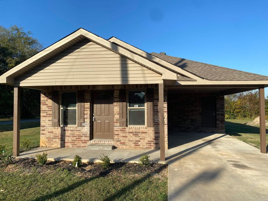 3 bedroom, 2 bath brick home with attached carport. Newly remodeled with new appliances including refrigerator. Also has new paint, new flooring, new cabinet doors. Large walk-in closet in the primary bedroom. Roof and HVAC are about 5 years old. This home is located on a large corner lot. Make time to view 801 Christy Ave Trumann AR today.