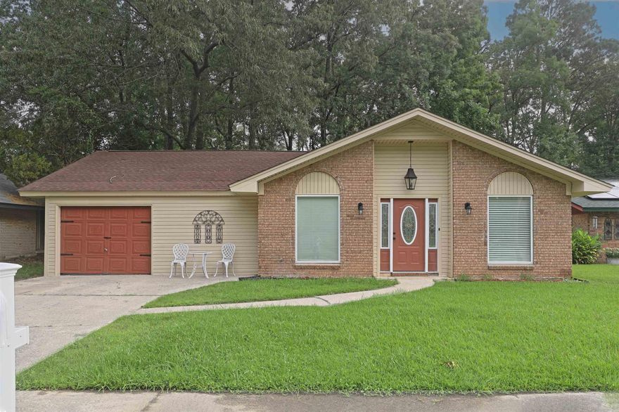 Step into this 4-bedroom, 2-bathroom home offering 1,934 square feet of updated living space. Inside, you'll find luxury vinyl flooring and tile throughout and an open-concept floor plan that's perfect for both everyday living and  entertaining. The brand-new kitchen features sleek granite countertops, breakfast bar, and a seamless flow into the living and dining areas. Both bathrooms updated with custom-tiled showers, while an oversized laundry room that is super convenient for busy households. Step outside to enjoy a fully fenced backyard, perfect for pets, play, or relaxation.  Major updates include all new internal parts for HVAC system, water heater, and roof—all less than 2 years old and energy efficient to help keep utility bills low. Don’t miss out on this move-in ready home! Schedule your showing today!