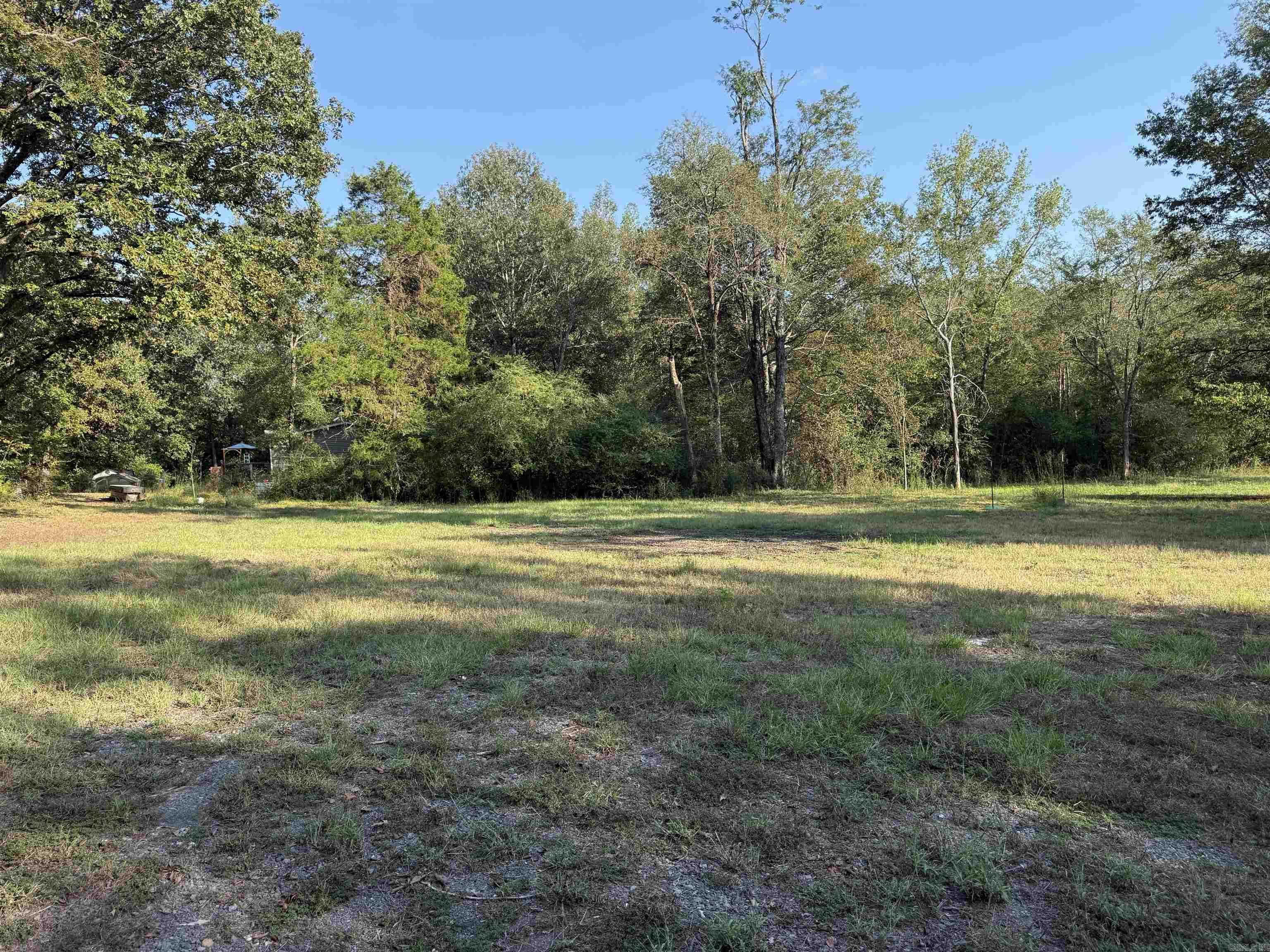 Beautiful 6.67 acre plot of land where the old house was that burned down .OLD well on property, City water on the property ,Natural gas at front of property . Septic tank on it also .Cleared spot on front of property or build it on the top of the hill with view of valley below .Loaded with trees sloped rolling hills lots of wildlife on the property very private and secluded land at the end of the dead end road no thur traffic.
