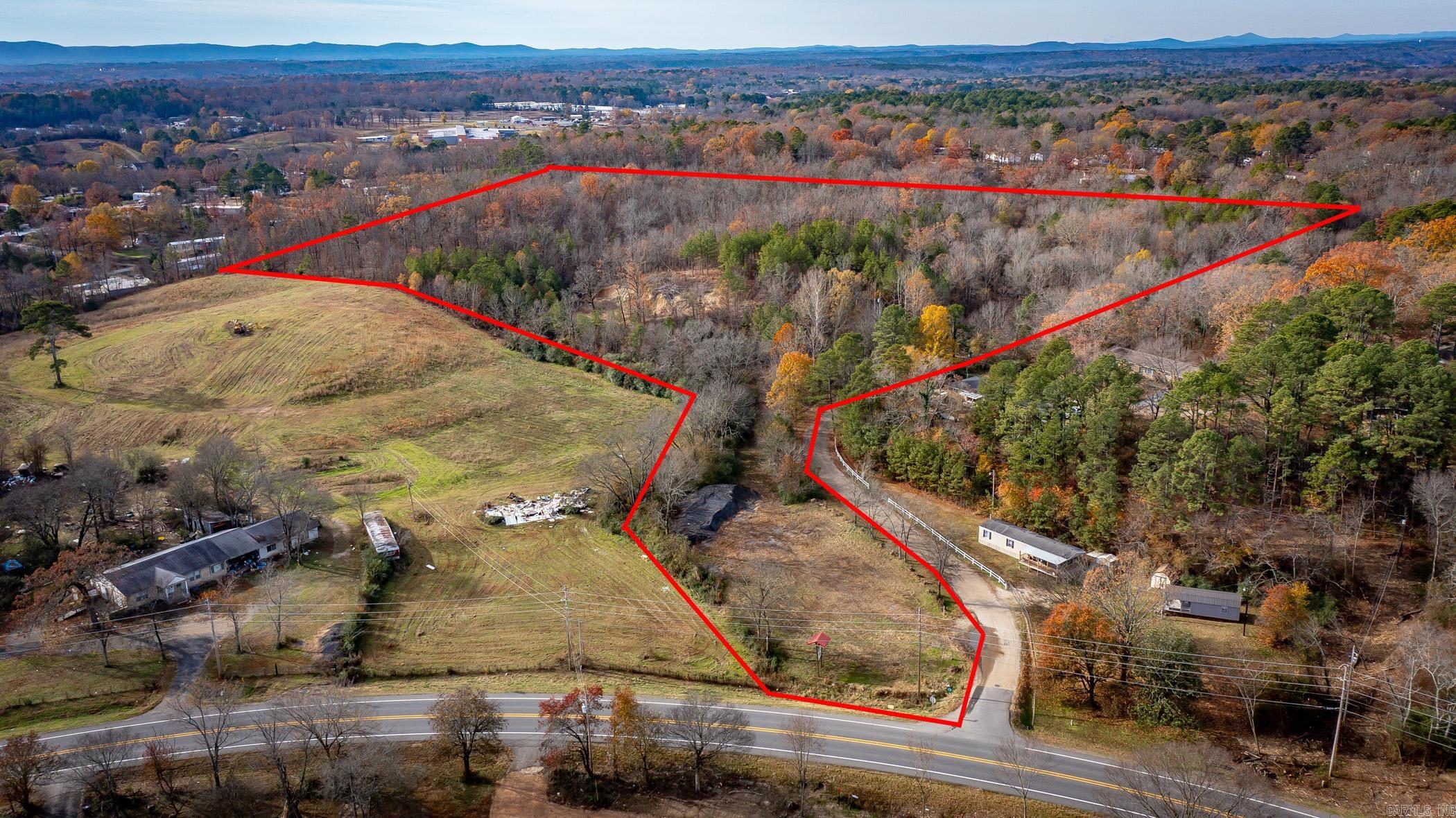 Stunning 19.5-Acre Property with Scenic Views and Modern Utilities Discover the perfect blend of natural beauty and modern convenience with this remarkable 19.5-acre property, ideally located on Mountain Pond Road. Whether you dream of building a custom home, developing a picturesque retreat, or investing in a slice of paradise, this expansive tract offers endless possibilities. Key Features: Prime Location: Enjoy easy access to Mountain Pond Road, providing both privacy and proximity to nearby amenities. Utilities Available: Benefit from city water and sewer services, along with available electricity, making development straightforward. Natural Beauty: Immerse yourself in tranquility with three charming ponds on the property, offering serene views and recreational opportunities. Versatile Land Use: The generous size allows for residential development, agricultural pursuits, or as a private escape from everyday life. Donāt miss this unique opportunity to own land that combines natural allure with modern amenities. Contact us today to schedule a viewing and start envisioning your future on this exceptional property.