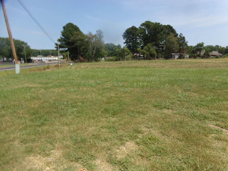A great location to build or develop prime property close to interstate not currently in city limits, but Ward and Austin water close by. Sewer across the street, property would have to be annexed first.