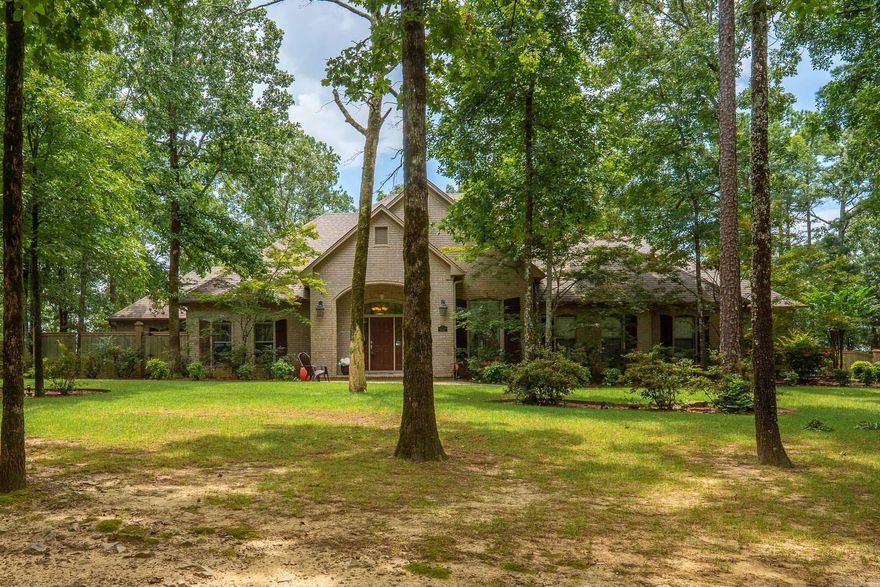 Wonderful Dogwood Estates property with 6 bedrooms, 4 1/2 baths, 3 living areas, nestled on 3.25 acres of scenic beauty in Conway! The beautiful living room with fireplace, formal dining room & sunroom create a warm, inviting atmosphere with abundant natural light & access to the outdoor living areas. The kitchen is a chef’s dream complete with stainless steel appliances, double ovens, gas range, and two expansive islands offering both function and flow for entertaining. This spacious home offers 5 generously sized bedrooms on the main level each w/large closets. The primary suite has tray ceiling, fireplace & large bathroom w/double sinks, walk-in shower & separate tub. 6th bedroom & full bath upstairs alongside a versatile bonus room with kitchenette/wet bar perfect for a media space, game room, or playroom.   Outside enjoy the spacious deck & screened-in porch offering breathtaking views of the surrounding area. The home also features a large three-car garage with a workshop area.