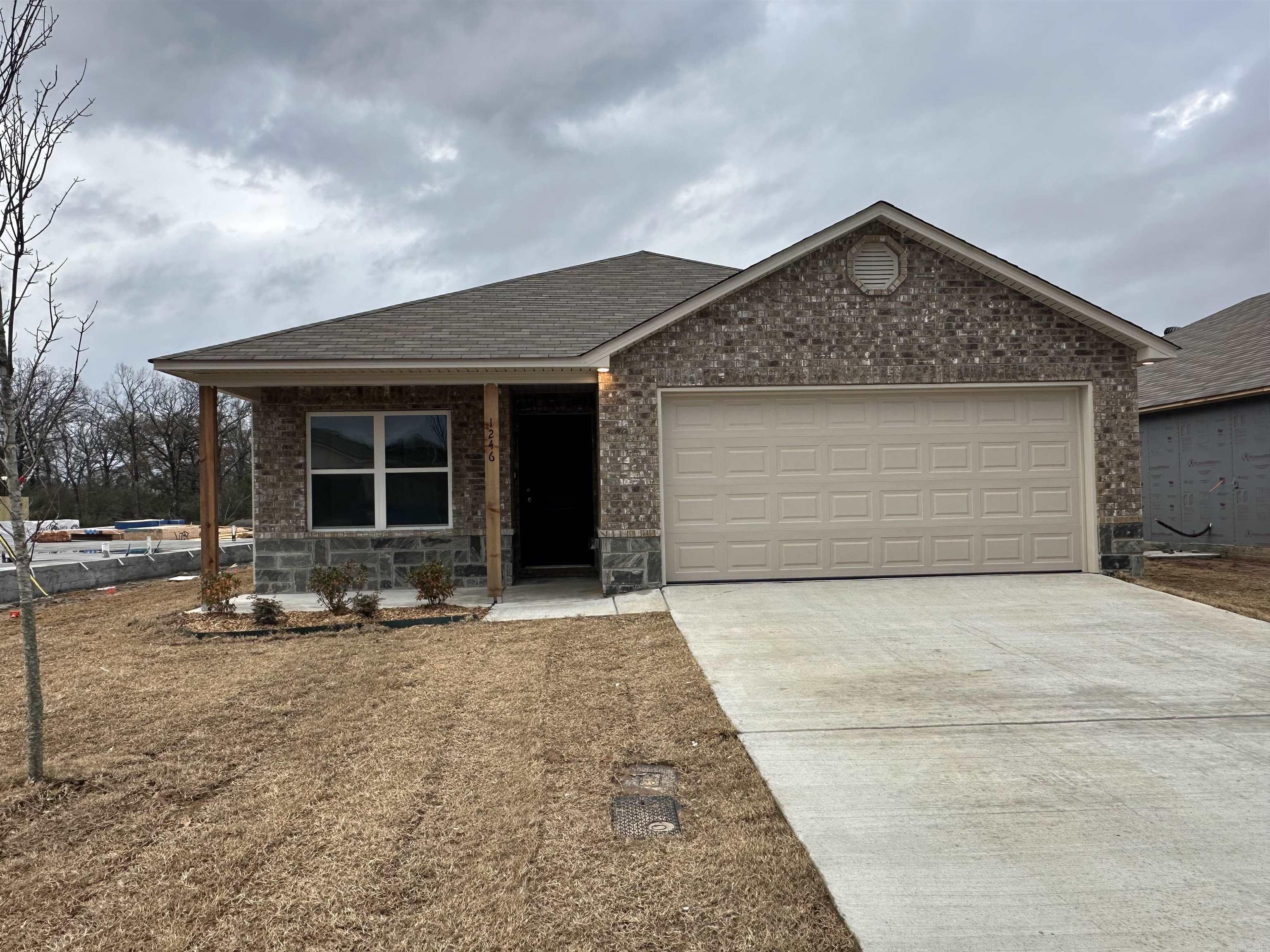 The Chadwick plan is a beautiful open concept plan waiting for your tour! This plan has special features like a unique closet configuration in the Master Suite and a covered back patio. Check it out today! Valuable upgrades included in this home: plumbing faucet upgrade 2, 8" deep Kitchen sink, door bell, HVAC rigid duct upgrade, flush laminate bar top in Kitchen, Luxury Vinyl Plank flooring in wet areas and Living Room and adjacent hallways and all Bedrooms including closets and in Optional Bedroom, add additional bedroom per municipal requirements, raised ceilings in Whole House per municipal requirements, fiberglass exterior doors, Cheyenne style doors, added Master Closet door, baseboards level 2, 25in wide attic stairs, LED disk lights in Kitchen, full sod, microwave hood in Kitchen. THIS HOME IS SCHEDULED TO BE COMPLETE IN EARLY DECEMBER.