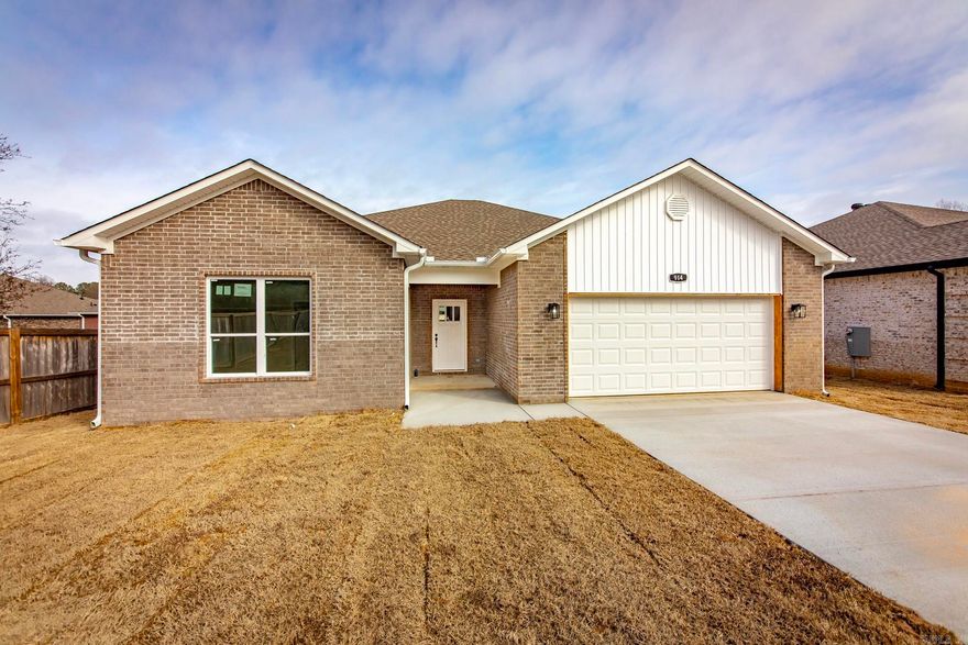 Welcome to this beautiful new construction patio home in Gated Community.   This stunning 3-bedroom, 2-bath patio home offering 1,500 square feet of thoughtfully designed living space in a desirable gated community. This brand-new home features an open floor plan that seamlessly connects the kitchen, dining, and living areas-perfect for both everyday living and entertaining.  The vaulted ceiling in the living room enhances the spacious feel, while luxury vinyl flooring flows throughout the home for a modern, low-maintenance finish.  The kitchen beautifully appointed with granite countertops, a tile backsplash, and plenty of cabinetry for storage.  The primary suite is privately located apart from the other bedrooms and features a large walk-in tile shower with generous closet space.  Enjoy outdoor living on the covered back patio, and appreciate added convenience with a separate laundry room and energy-efficient HVAC system for year-round comfort. This home offers style, efficiency, and comfort-all within a secure, gated community.