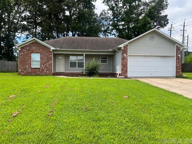 3 Bedroom home, spacious laundry room with pantry storage area, Fenced back yard. Fresh paint.