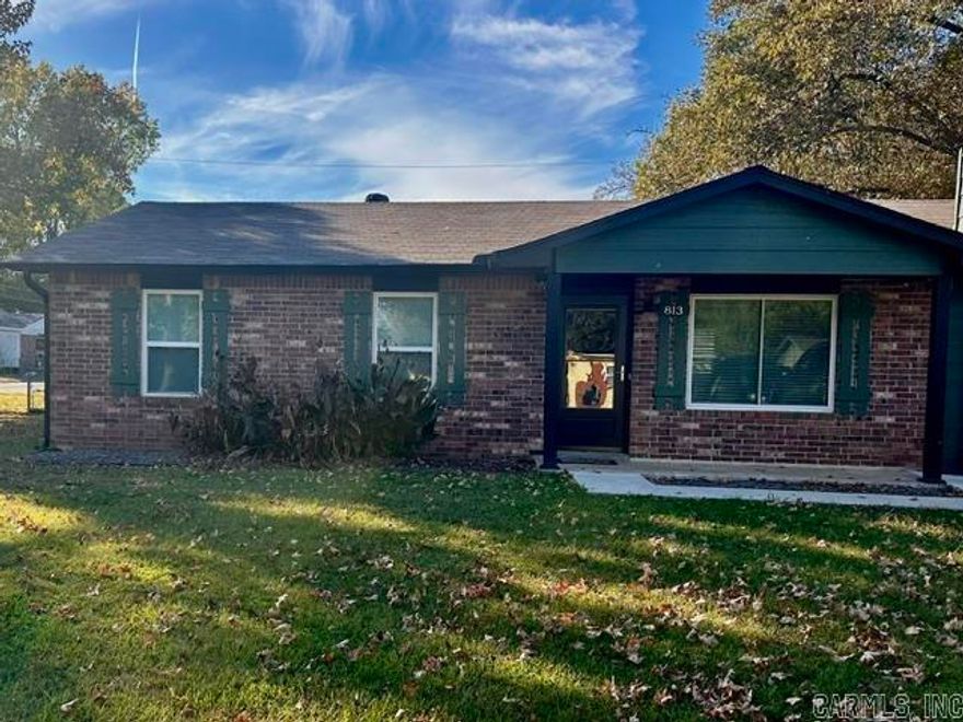 This inviting home sits on a spacious corner lot and offers both style and functionality. This three year old roof provides peace of mind for years to come, while the interior features granite countertops and stainless steel appliances that make the kitchen a true standout. A large utility room with abundant cabinetry adds convenience and extra storage space.  outside, you'll find a detached garage that doubles as a workshop, perfect for hobbies or additional storage. The fully fenced backyard provides privacy and a great space for pets, play or entertaining.   With its thoughtful upgrades, practical layout, and desirable central location, this home is move-in ready and full of charm.  See agent remarks