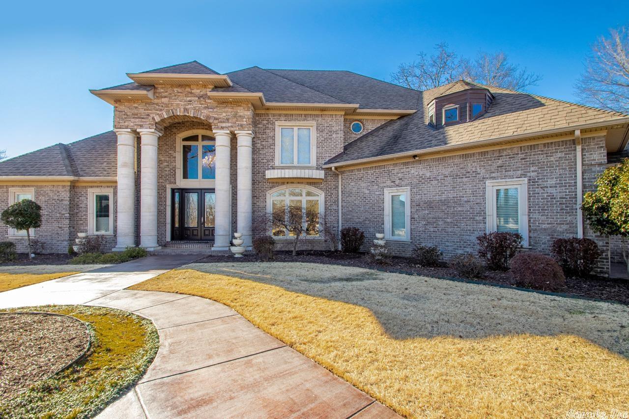 This stunning custom built home sits on an oversized lot in Hurricane Lake Estates. Home offers 4 bedrooms 3.5 baths, 20 ft ceilings, large windows, 3 fireplaces,open floor plan, 8 ft solid core doors,chefs kitchen with custom walnut cabinetry and stairs, granite,gorgeous hearth room with custom cabinetry in office,laundry room,open bonus room upstairs,tankless water heater,lifetime shingles,generator,outdoor kitchen w/fireplace,sw pool, grill,and fridge,2 boat docs,10 zone ss, fenced yard,4 car garage