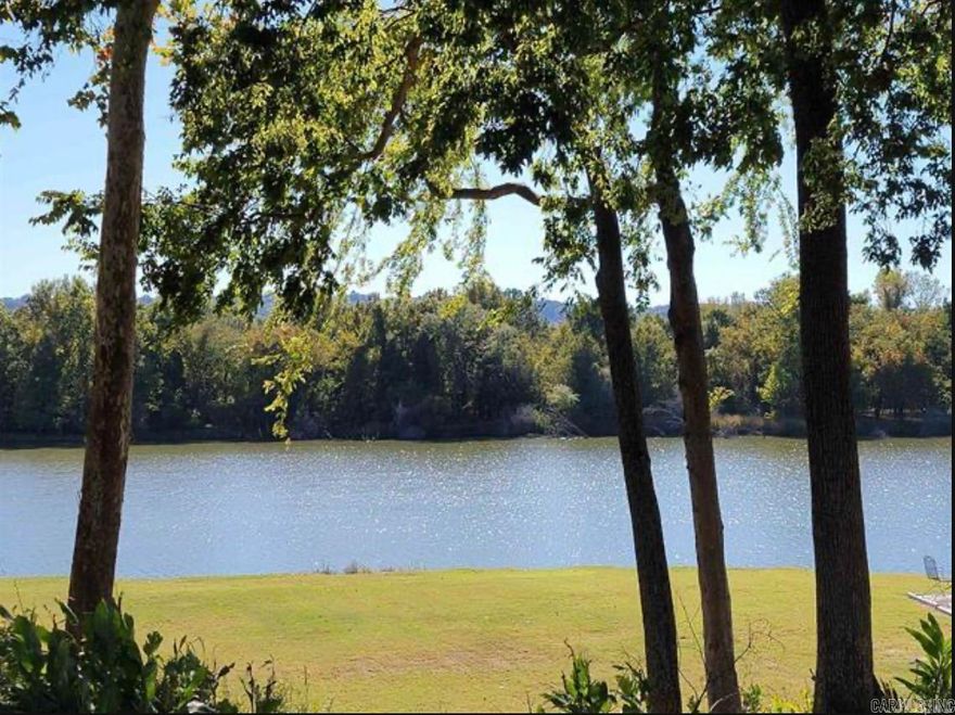 Build your dream home on this beautiful level lot in subdivision looking at the Arkansas River. Neighborhood amenities include a large playground overlooking river, fire pit and grill spot for gatherings and launch pad. Lot is mostly cleared for your build with a minimum square foot requirement of 2200.