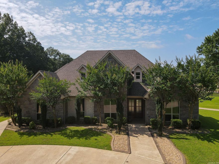 Entertainer of the year might live here! Pool parties, seasonal parties, card parties, birthday parties! Super kitchen with everything you'd need to create great foods and atmosphere! Everyone can spill over into the huge living area complete with wet bar and steps away from your covered patio and in ground pool! When your family is not entertaining they'll enjoy classy living quarters each with access to a private bath, shower, sink and commode! The Primary suite is a large room in itself, with a spacious ensuite with a jetted tub, separate shower and a closet the size of another bedroom! Within steps of the Primary BR/BA is the laundry room, and a nice private office! There are 2 garages with a total of 3 bays and lots of storage! Let's get going so you can spend the rest of the summer at your 2.45 acre refuge, sipping your favorite beverage poolside while catching cool breezes and enjoying the laughter of friends and family! Please note that Seller has left carpet out of all upstairs bedrooms and gameroom so that Buyer can negotiate what color carpet they'd like.