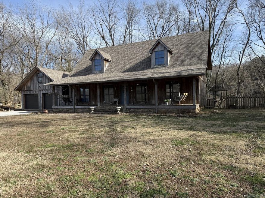 150' of White River frontage with easy walk to the water! Cypress Exterior Siding,  3 bedroom, 3 full bath, study/office for could be a 4th bedroom, 2 car attached garage, two covered decks with peaceful views of the White River, full covered front porch and a total of 6 lots. Cypress siding home w/propane log fireplace, wood flooring through-out, gorgeous kitchen. Main level living room with fireplace, dining area, kitchen, full hall bath, bedroom, garage & utility room. Upstairs primary bedroom, covered deck view of the White River, large walk-in closet, primary bathroom, full bath, bedroom, & study/office. Plus a whole house generator.