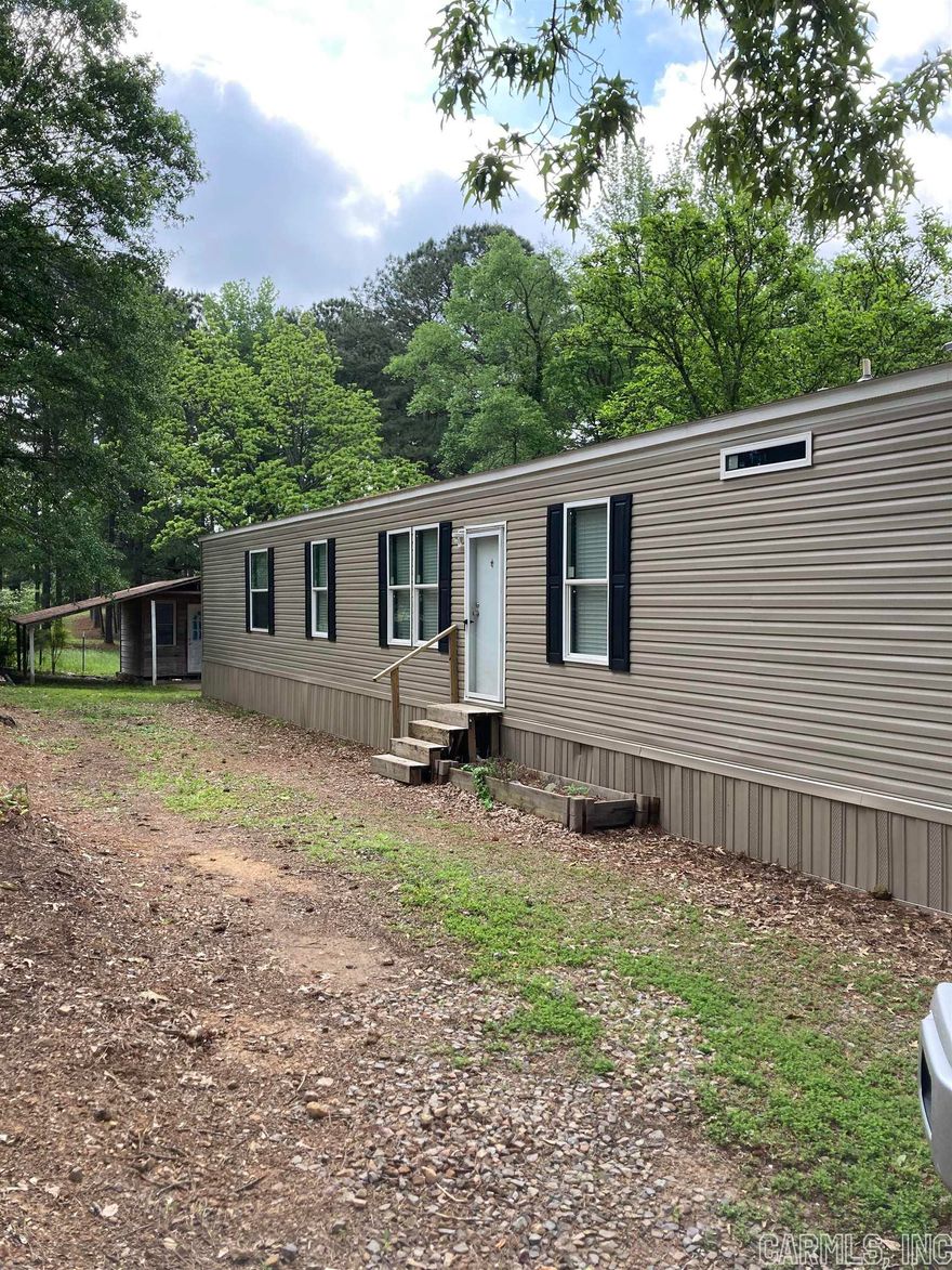 This mobile home is a 2020, 16 x 72 3 bed/ 2 bath on approximately 2 city lots. It features all electric appliances which are all included in the purchase. It also comes with a small storage shed! It is move-in ready at only two and a half years old.