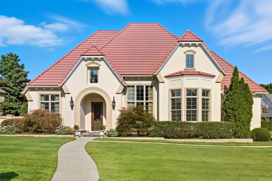 Come visit this beautiful home in a gated community built by David Pickering Sr.! Step inside to a thoughtfully designed floorplan with gorgeous flooring, tall ceilings, detailed trim work & privacy. Off the foyer is the formal living & dining room with updated light fixture, plus an executive office with built-ins & coffered ceiling. Main level offers a guest bedroom & luxurious primary suite with spa-like bath & large walk-in closet. Chef’s kitchen boasts custom cabinetry, top-end appliances, 6-burner gas range, granite counters, 2 pantries, dry bar, ice maker, 3 dishwashers & prep sink. Second living area off kitchen includes gas fireplace, breakfast space & second staircase. Upstairs are 3 bedrooms, 2 baths, media room with seating, 3D projector & sound system, plus bonus room with wet bar. Features include plantation shutters, 3-car garage with custom cabinets, landscape sprinkler, whole-home speaker system, covered patio, privacy trees & concrete privacy fence with Stucco finish. Stucco finish on home installed 2012. Recent updates: 2 new water heaters, new AC 2025, 50-yr composite roof Quarrix (2012). Golf cart access to Founders Golf Course. Agents see remarks.