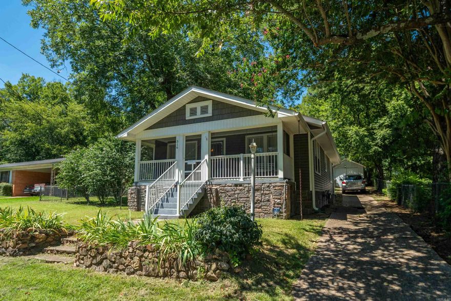 Welcome to 316 Vineyard, a beautifully maintained 2-bedroom, 1-bath home that blends classic charm with modern convenience. Nestled on a shaded lot with mature trees, this inviting home boasts a cozy screened in front porch perfect for enjoying quiet mornings or relaxing evenings.  Step inside to discover original hardwood floors, abundant natural light throughout. The living room features built-in shelving and flows seamlessly into a spacious bonus room—ideal for a home office, formal dining, or creative studio.  The large kitchen offers ample cabinet space, open shelving, and a newer gas stove—perfect for cooking and entertaining. The bathroom is clean and functional, while both bedrooms provide comfortable layouts and closet space.  Outside, you’ll find a long private driveway, detached garage, and a lush backyard that offers space to garden, play, or unwind.  Well cared for and move-in ready, this home is the perfect fit for first-time buyers, downsizers, or investors. Conveniently located near local shops, dining, and parks—don’t miss your chance to make this gem your own!