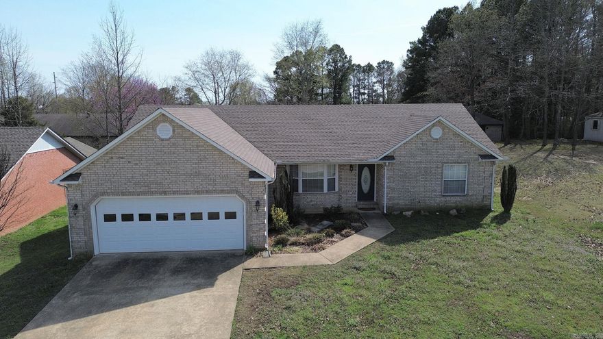 Charming 3-Bedroom Brick Home with Spacious Layout and Great Outdoor Space! This beautiful 3-bedroom, 2-bathroom brick home features a split floor plan, offering privacy and functionality. The inviting living area is enhanced by recessed lighting, while the breakfast nook and formal dining room provide ample space for meals and entertaining. The main bedroom boasts an ensuite bathroom complete with a whirlpool tub and separate shower for ultimate relaxation. Step outside to enjoy the large deck overlooking the fenced backyard, perfect for gatherings or quiet evenings. Conveniently located with easy access to the highway, making commutes to Jonesboro or Paragould a breeze. Don’t miss out on this fantastic home—schedule your showing today!