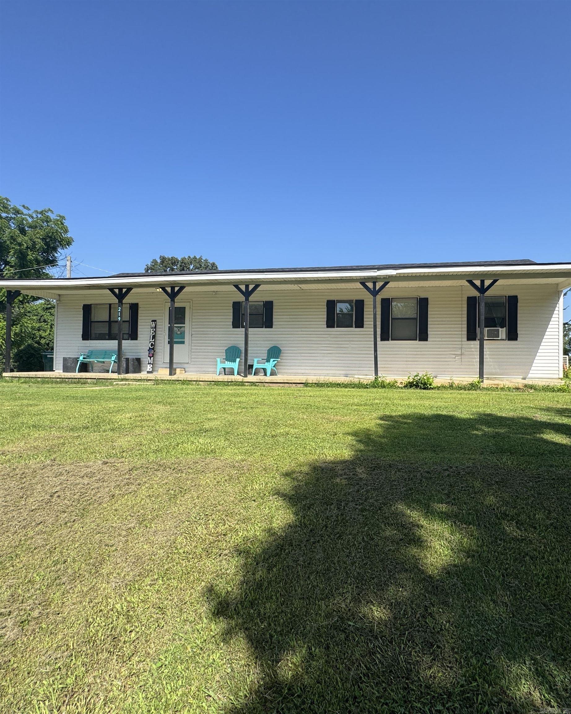 Country living at its best with this 4-bedroom/ 2 bath sitting on 4.79 acres with a stocked pond, so you can walk out of your home and go fishing. This home features a new roof and a large backyard, perfect for a garage or swimming pool. When you enter this home, you will find a dining kitchen, a laundry and pantry room, two rooms, and a bathroom located at the separate ends of the house. One room is currently being used as a closet area. This property is a must-see if you want country and not a lot of gravel. The house currently only has 1/2 of the ducts with the HVAC and there is currently window units in some of the rooms. The stove and dishwasher will be staying with the house.