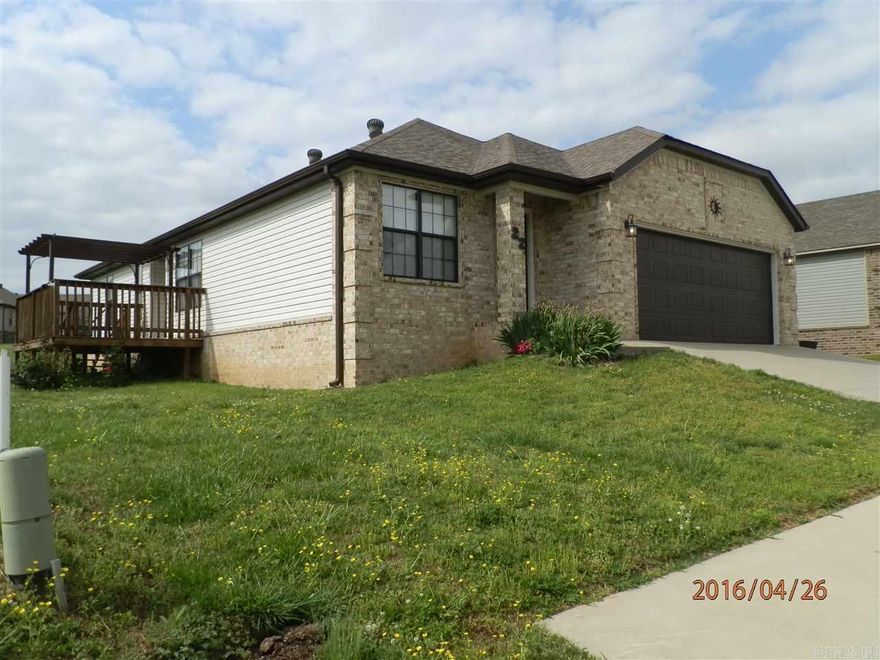 Take a look! This well maintained home has open living area, separate laundry room, two-car garage and deck with pergola. Living room and bedrooms have carpet. Stained concrete floors are everywhere else.  Refrigerator, electric range, microwave and dishwasher are provided. No pets allowed. Tenant is responsible for all utilities and lawn care. Not on HUD Section 8 program. Application is required. Application fee charged.