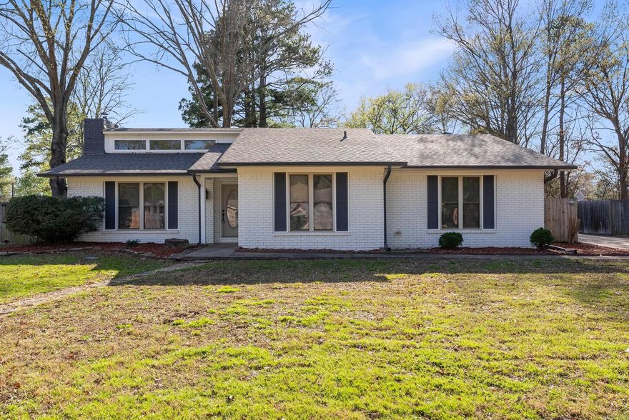 West Conway stunner! Remodeled home in the desirable Oak Forrest neighborhood on an oversized corner lot and new roof! The architectural details of this home are anything but cookie-cutter. Custom windows in the living room that lets in natural light. The undulated ceiling is striking, as is the fireplace that acts a a centerpiece to the room.  Room off the living room could be used as a study, flex space, or second sitting area. Built-ins to the left of the fireplace.  There is an additional 220 square foot heated and cooled room off of the garage that is not even included in the advertised square footage! Great space for an office or hobby room.  New granite countertops and backsplash in the kitchen. Luxury vinyl floors throughout.  New paint throughout the home. New exterior paint. Primary suite with custom tile shower and not one but 2 primary closets! Fenced back yard. 2 car garage with a 3rd bay that is perfect for housing golf carts, lawn mowers, or could be used as a shop. Tree-lined streets in the neighborhood give it character. Kroger is only 1 minute(!) away by car. Close to many great Conway restaurants. Quick access to Julia Lee Moore Elementary & Conway High School.