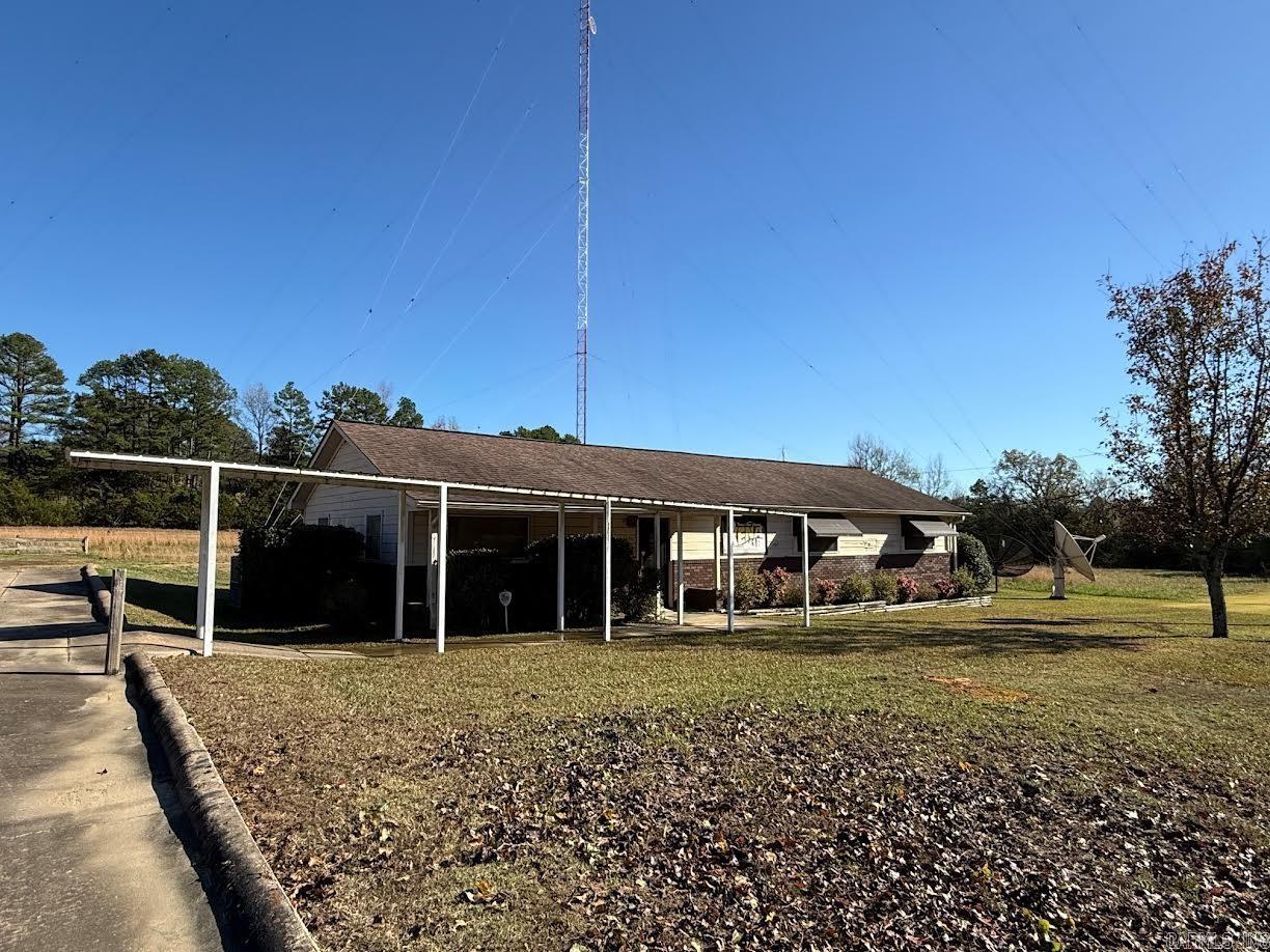 Previously a radio station, this 3 acre lot has a level parking area and high visibility, great location near Highway 71 and the intersection of Highway 375 and Highway 8 on the West side of Mena. Nice storage building and propane generator convey but propane tank does not. The Tower is to be removed.