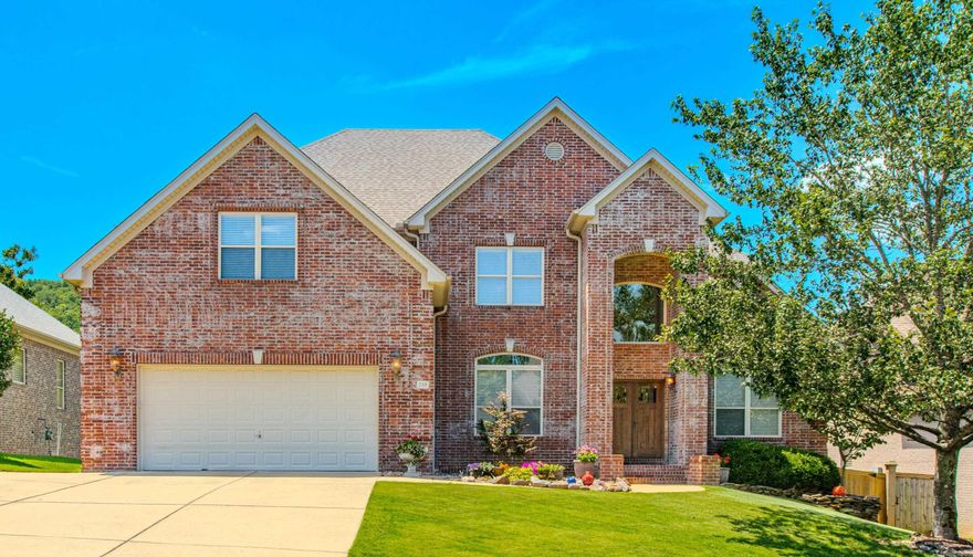 Beautiful two-story brick home offering space, comfort, and wonderful outdoor living. Inside you’ll find hardwood floors, tall ceilings, and spacious living areas designed for both everyday living and entertaining. The kitchen features abundant cabinetry, granite countertops, stainless appliances, a center island, and an eat-in dining area. Just off the kitchen, step onto the covered deck and enjoy beautiful elevated views of the backyard and surrounding hills.  The main level includes a dedicated office and a spacious primary suite with a large walk-in closet and a well-appointed bath featuring double vanities, soaking tub, and separate shower. Upstairs and additional living areas provide flexibility for family or guests.  The backyard is made for Arkansas summers with an in-ground pool, large patio space, and privacy fencing—perfect for relaxing or entertaining. All of this in a convenient location close to city amenities. Make an appointment today!