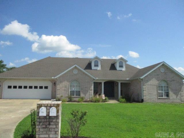 Very Spacious Home in Established Subdivision, as you enter the Foyer you find storage areas on either side of entrance to the Great Room which opens up to a large vaulted room and Gas Log Fireplace, to the left you'll find a large formal Dining Room, Roomy Kitchen (including new Microwave, Range and Dishwasher) and a Breakfast Area that looks out to a Screened Back Patio, continuing to the backyard you find a large fenced yard that includes a 24'x30' shop with overhead and walk-thru door (perfect for the hobby enthusiast or workshop), there is also an above ground Storm Shelter. The large Primary Bedroom is enhanced with a coffered ceiling, Primary Bath includes a jetted tub, 4' Shower and Primary Closet large enough to be another bedroom. The flooring is new in the Great Room, Dining Room and all Bedrooms. Water Heater has also recently been replaced. Don't wait to see this great home and make it yours!