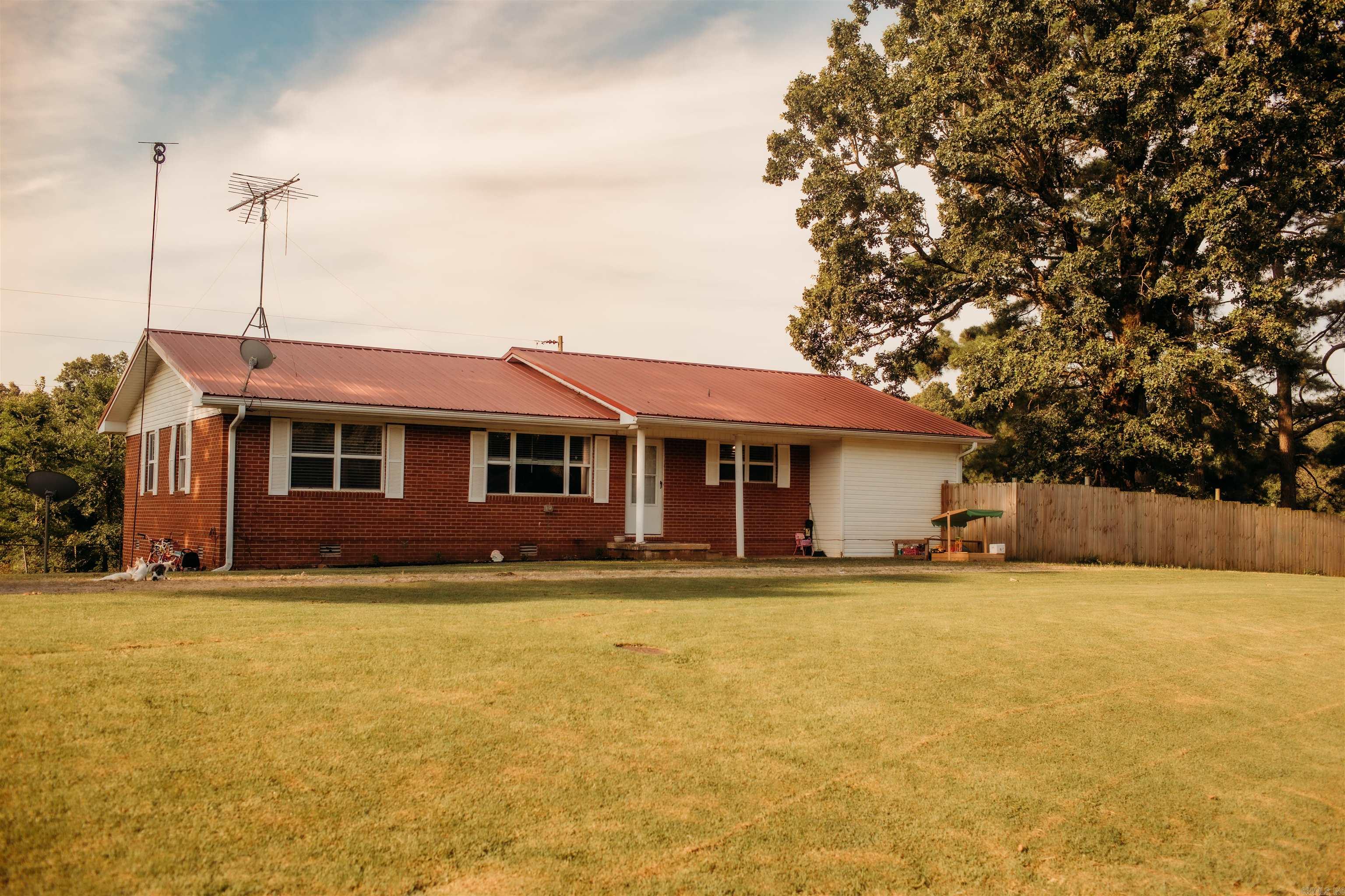 232 County Road 440, Piggott, AR 72454 This stunning property has it all ā space, privacy, and endless possibilities. Featuring a 3-bedroom, 2-bath home with a bonus room, this residence is perfect for comfortable country living. Step outside to your 6-foot private fenced backyard, ideal for pets or play. The real gem, 52 acres of fully fenced land complete with two ponds, a 30x40 utility building, and a 36x48 barn with horse stallsāperfect for livestock, storage, or hobbies. Thereās also a 12x24 storage building and an additional structure on the property that could be updated for guest housing, a rental, or in-law quarters. Whether youāre looking for a hobby farm, equestrian setup, or private homestead, this property offers the flexibility and freedom to make it your own. Donāt miss this rare opportunityācall today to schedule your private showing! Listed with Forrest Realty | Contact: Theresa Van Barkenhuizen ā 870-324-3331