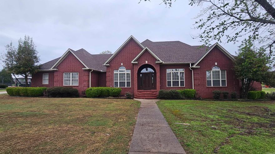 Wow! #11 tee box just behind house! Instant access to golf course! This house is ready to move in with it's open living, kitchen, and dining area, an office There is hardwood flooring and carpet. There is an excellent covered patio overlooking the golf course and fenced in backyard. 3 car garage and updated HVAC unit. HOA fee is $50.00 monthly.