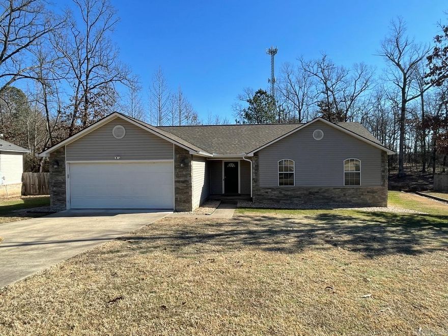 Check out this move in ready three bedroom, two bath home with rock and vinyl siding exterior. This well maintained home is meticulously clean and includes vaulted and trey ceilings, 2" wood mini blinds, lots of natural light, an eat in kitchen with a breakfast bar..microwave included, laundry with cabinets and large bedrooms with generous closet space. Conveniently located close to the LRAFB and located in a cul-de-sac, this home has a private backyard with green space beyond the property boundary.  The roof was replaced in 2021, HVAC replaced in 2023, HW Heater replaced in 2020. Agents See Remarks.