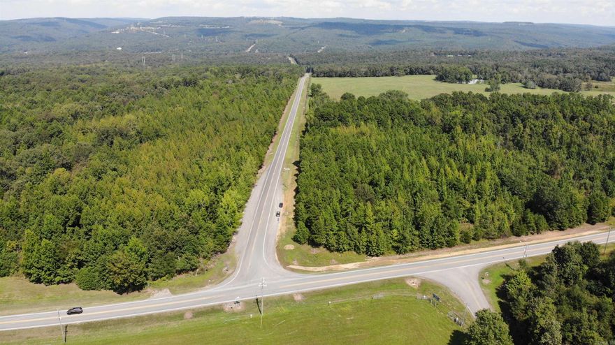 Beautiful flat parcel on Hwy 92. Water and electric on property. About a mile to Greers Ferry Lake.  Part of the property may be in the HWY easement.  A survey will be needed!  Neat location!!!